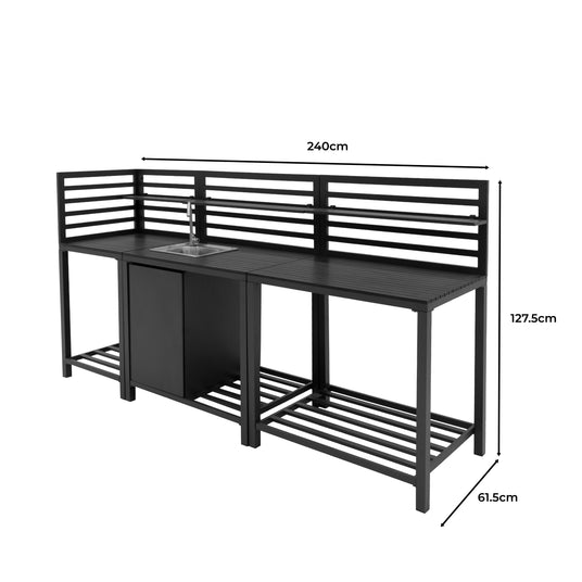 Cocina exterior modular de aluminio en color negro, con tres secciones, superficie de trabajo amplia y diseño contemporáneo y funcional