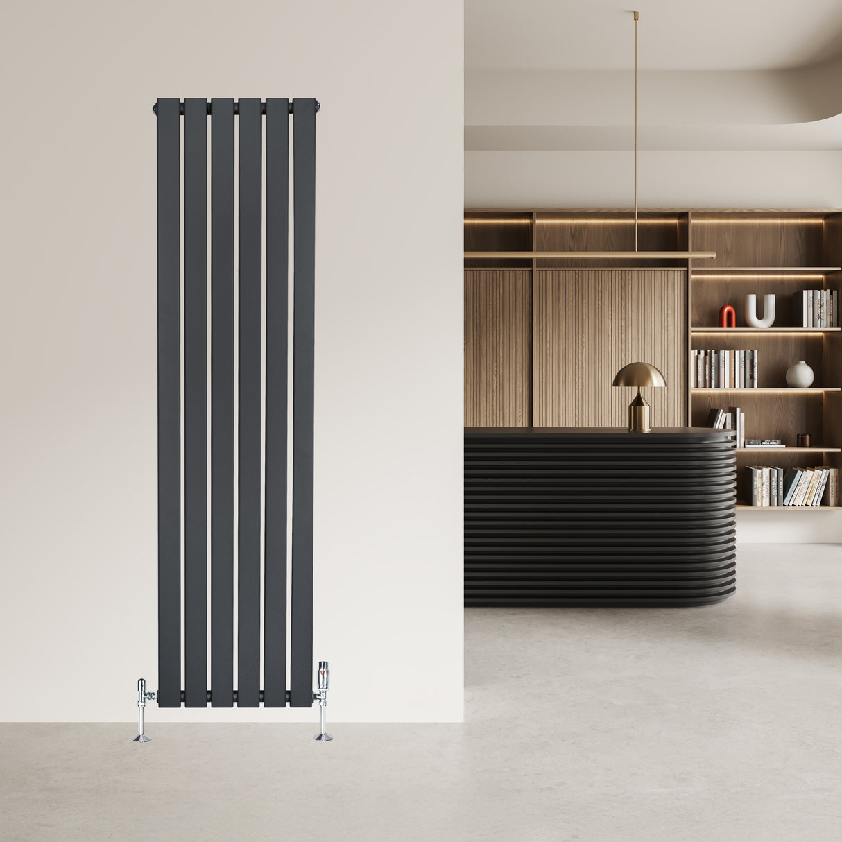 Radiador plano de columna simple en gris antracita, con válvulas, instalado en una pared clara, ideal para decoración moderna