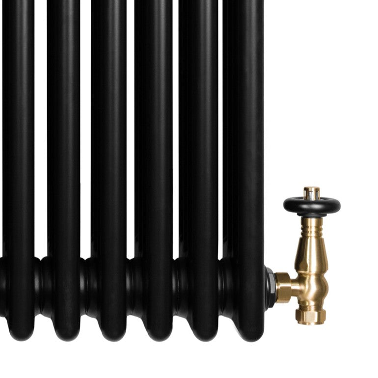 Radiador tradicional de 4 columnas en color negro, con válvula de bronce y acabado liso, ideal para calefacción eficiente
