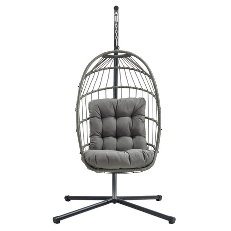 Silla colgante tipo huevo de ratán gris con cojín acolchado, estructura metálica negra y diseño moderno y elegante