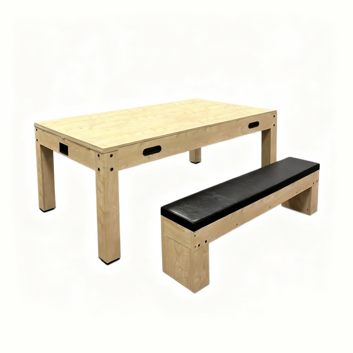 Mesa de juegos de roble clara con superficie lisa, acompañada de un banco negro de cuero sintético, ideal para entretenimiento familiar