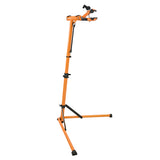 Soporte de reparación para bicicletas en color naranja brillante, con estructura ajustable y patas antideslizantes para mayor estabilidad