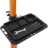 Soporte de reparación para bicicletas con bandeja negra, herramientas organizadas y superficie antideslizante, ideal para mantenimiento