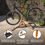 Soporte de reparación para bicicletas en color negro y naranja, con bandeja magnética y abrazadera ajustable para el cuadro
