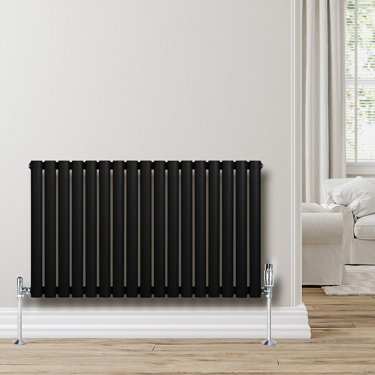 Radiador de columna ovalado negro de 600 mm x 1020 mm con válvulas, acabado mate y diseño moderno, ideal para espacios elegantes