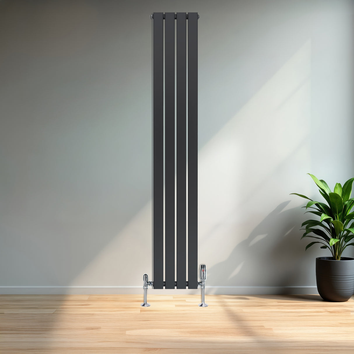 Radiador plano de columna simple en gris antracita, con válvulas, de 1800 mm x 280 mm, instalado en un ambiente moderno y luminoso