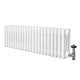 Radiador tradicional de 4 columnas en color blanco, con válvulas, diseño alargado y acabado brillante, ideal para calefacción eficiente
