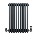 Radiador tradicional de 4 columnas en gris antracita, con válvulas metálicas brillantes y diseño elegante y robusto
