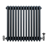 Radiador tradicional de 4 columnas en gris antracita, con válvulas metálicas brillantes y diseño robusto y elegante