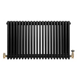 Radiador tradicional negro de 4 columnas con válvulas, diseño robusto y elegante, ideal para calefacción en espacios modernos