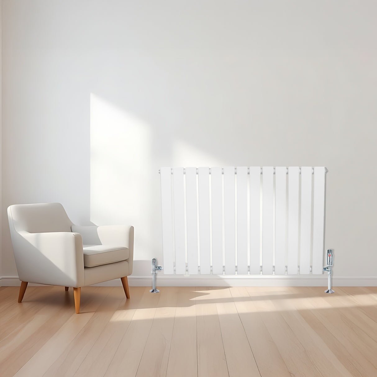 Radiador de columna única blanco de 600 mm x 910 mm, con acabado liso y brillante, instalado en una pared junto a una silla moderna