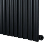 Radiador de columna ovalado negro de 1800 mm x 480 mm, con acabado mate y diseño moderno, ideal para calentar espacios elegantes