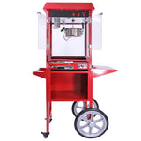 Máquina de palomitas de maíz KuKoo en rojo brillante, con estructura metálica, ruedas grandes y compartimento para almacenamiento